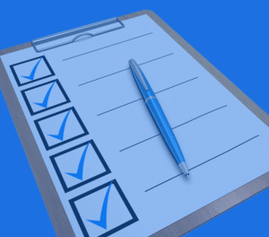 Clipboard with checkboxes and blue pen, representing new patient forms and resources for Active Life Chiropractic.