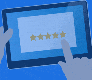 Person using a tablet to submit a five-star review for Active Life Chiropractic services.